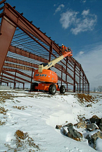 Телескопический подъемник JLG 600S фото 3